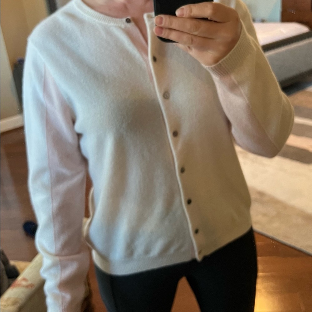 Cashmere button up sweater with cream color and pink on sleeves